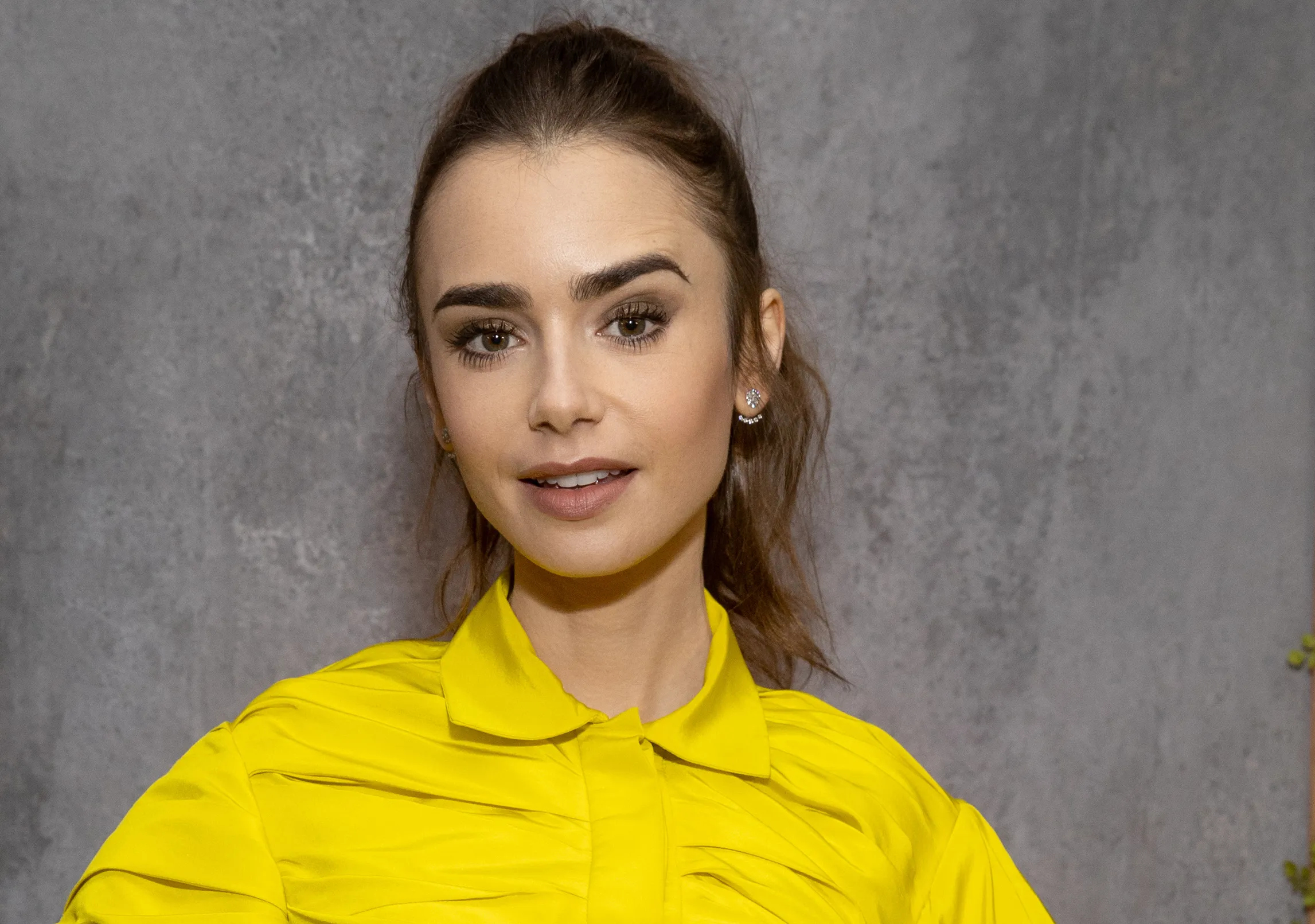 Lily Collins Channels French Girl Style in Chic Loafers & Chanel Bag –  Footwear News